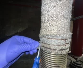 Presa de mostra de cordó trenat en una sala d'instal·lacions